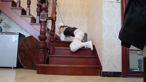BC16-An Asian girl with bandages wrapped around her neck was walked on a leash like a puppy.