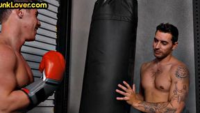 Sportive athletic jock barebacks bottom in gym after boxing