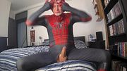 Spiderman wanking his erect cock and cumming with a big cumshot spurting cum over himself