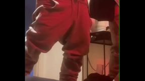 Amateur boy pissing in a glass held in his friend'_s mouth