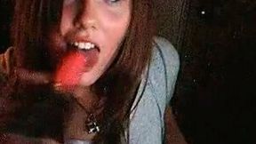 Young and sexy runette bitch with nice face licks the dildo