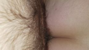 Riding reverse cowgirl