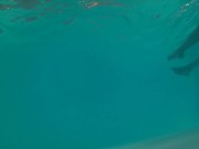 Underwater swimming with jockstrap in hotel pool