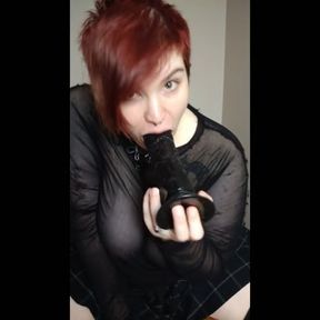 Chubby redhead plays with BBC toy