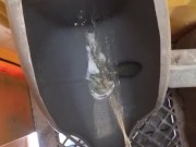 Taking a leak in the Port a Potty