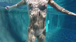 Teen girl with tiny tits wades naked in pool &mdash;  strokes a tiny cock&#x1F346;