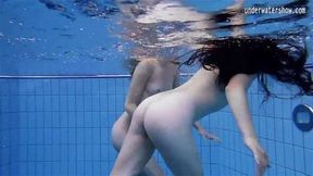 Enjoy a redhead underwater and lesbians