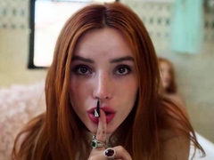 Sexy slender redhead posing seductively for the camera