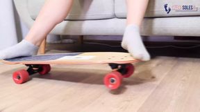 Sexy feet on the skateboard