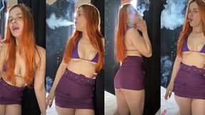 Redhead smokes 2 at once in a purple bikini and purple skirt - Marlboro red