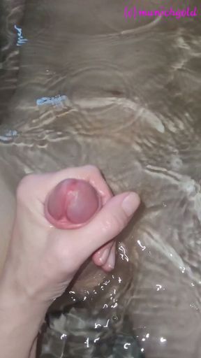 hot amateur munichgold gives her lover a handjob in the bathtub   Clip 1