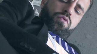 Suited stallion Hector de Silva masturbates his big cock