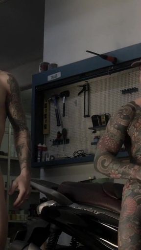 Two Friends in the Mechanic's Workshop