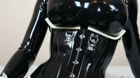 Double Masked Rubberdoll Inserts Vibrator in Rubber Pussy and Plays With Herself