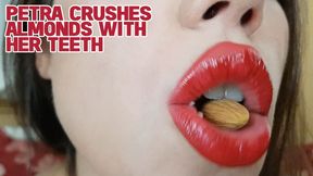 Petra crushes almonds with her teeth -HD