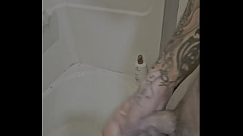 Rubing my cock in and out of the shower