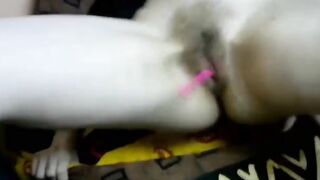 Fingering her hairy pussy with Lush