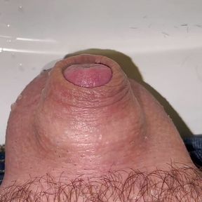 Tiny cock pissing