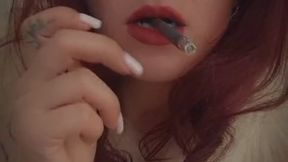 Clouds of smoke come out from my mouth and cream from my pussy