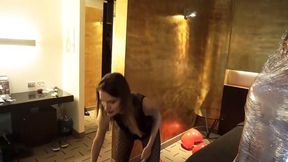 Femdom girl puts her slave in tape bondage