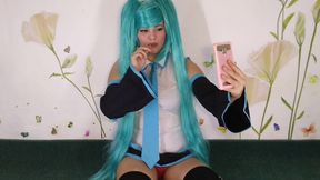 Miku is sucking on the candy and drooling
