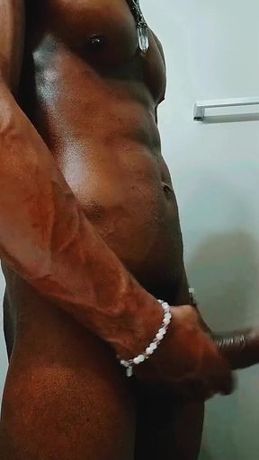 Oiling up My Big Black Cock