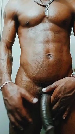 Oiling up My Big Black Cock