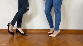 TWO GIRLS WEARING HEELS STEPPING ON EACH OTHER’S FEET - MP4 Mobile Version