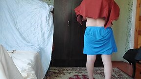 Boy to tranny transformation: blue skirt and white legs
