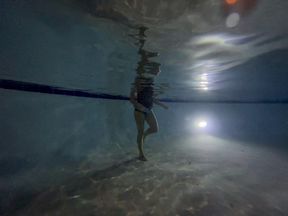 Carissa in an Esther Williams bathing suit and Classic Oval mask--Attracted to the Light