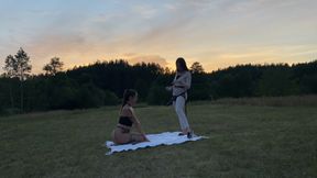 Mistress fuck submissive girl with BBC strapon in nature.