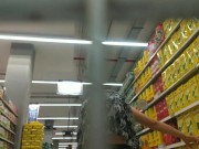 Upskirt and showing ass and vagina without panties in a famous super market store
