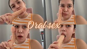 Oral sex to a dildo