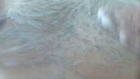 Washing my hairy chest while showering