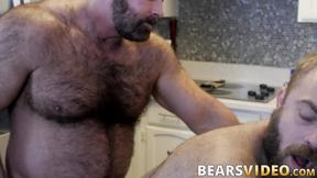 ”Unshaved daddy teases chubby hunk before hardcore barebacking”