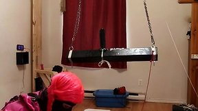 Cd maid stuck on large sextoy on wooden pony
