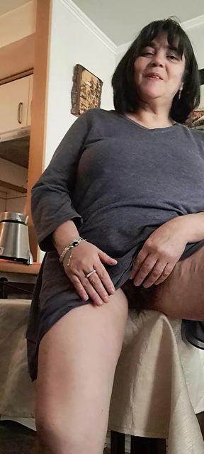 milf on the table seducing