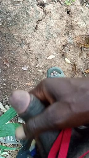 An Africans guy trying to wake his big dick