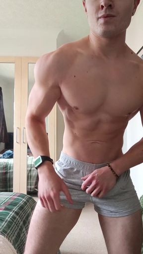 Twink shows off his flexed muscles