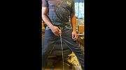 Desperately squirming around next to computer chair holding my piss while busy checking e-mails -  I take a long piss on the floor close to chair