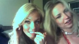 two lesbians sucking dildo