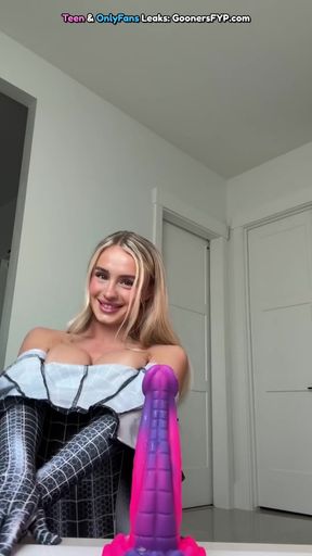 Assy blonde plays with a dildo and shows off her tits