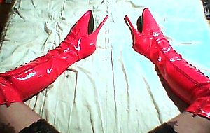 Crossdressing lady in latex