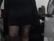 Crossdresser wearing black pantyhose