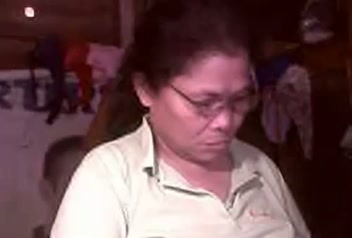 Old Asian granny is squeezing her swollen nipples on cam