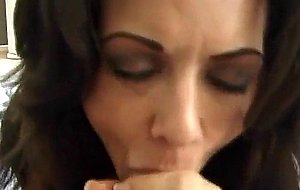 Busty Raquel Devine gets her face sprayed with cum