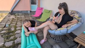Delilah and Faith - public foot domination with slippers - from above
