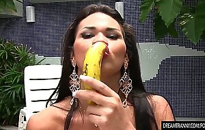 Shemale Erica Lee inserting a banana