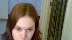 Absolutely shameless redhead teen fucks her pussy with huge dildo on webcam