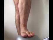 Super squishy gym ball under my big male feet tiny ball makes my feet feel enormous - MANLYFOOT